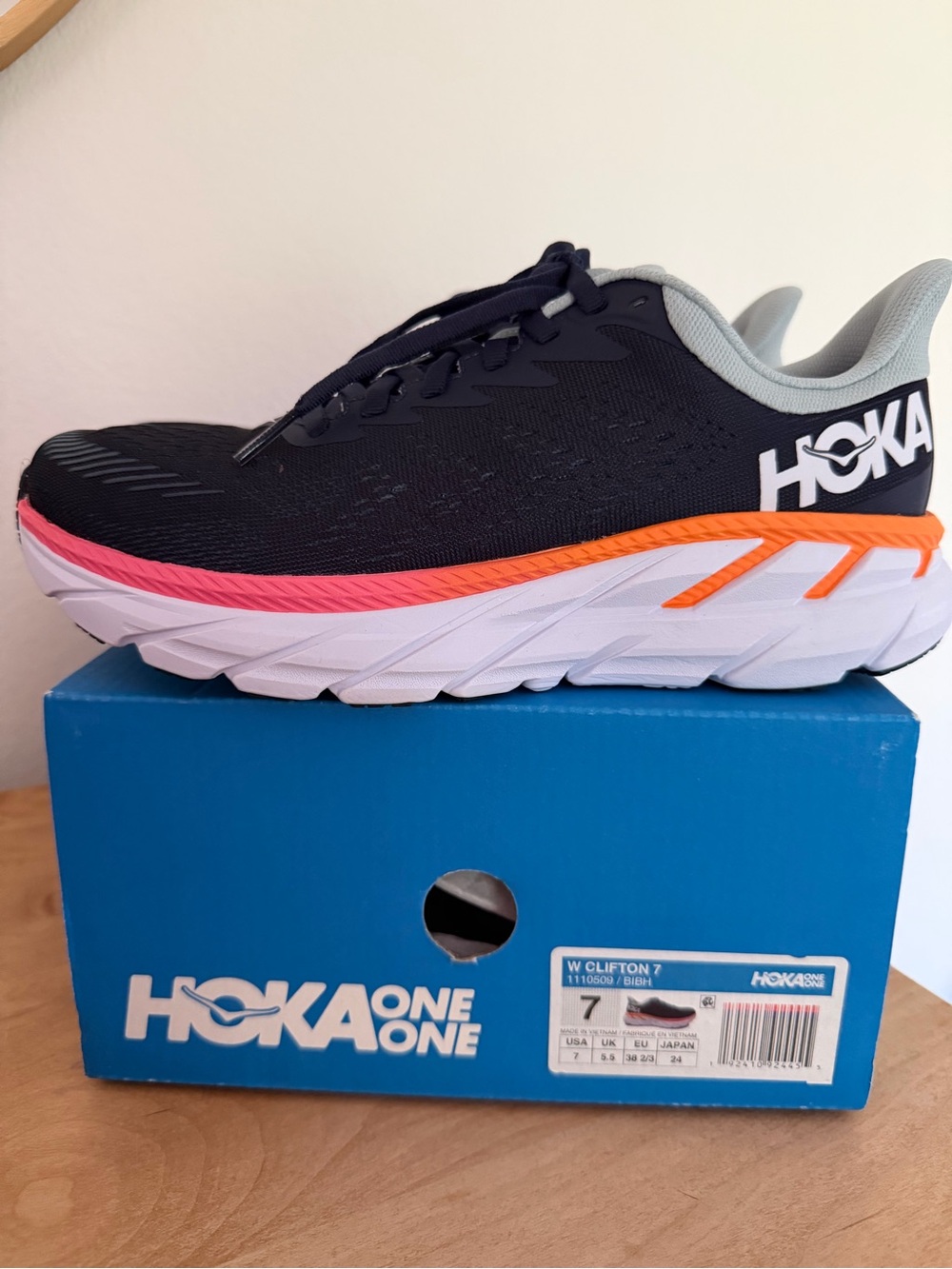 Hoka One One Women’s Clifton 7 Sneaker - Navy with Pink & Orange Accents